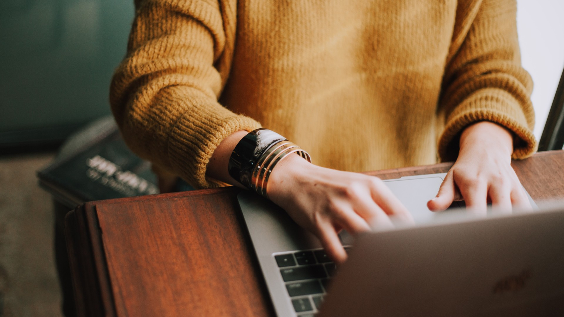 A person sitting at a laptop