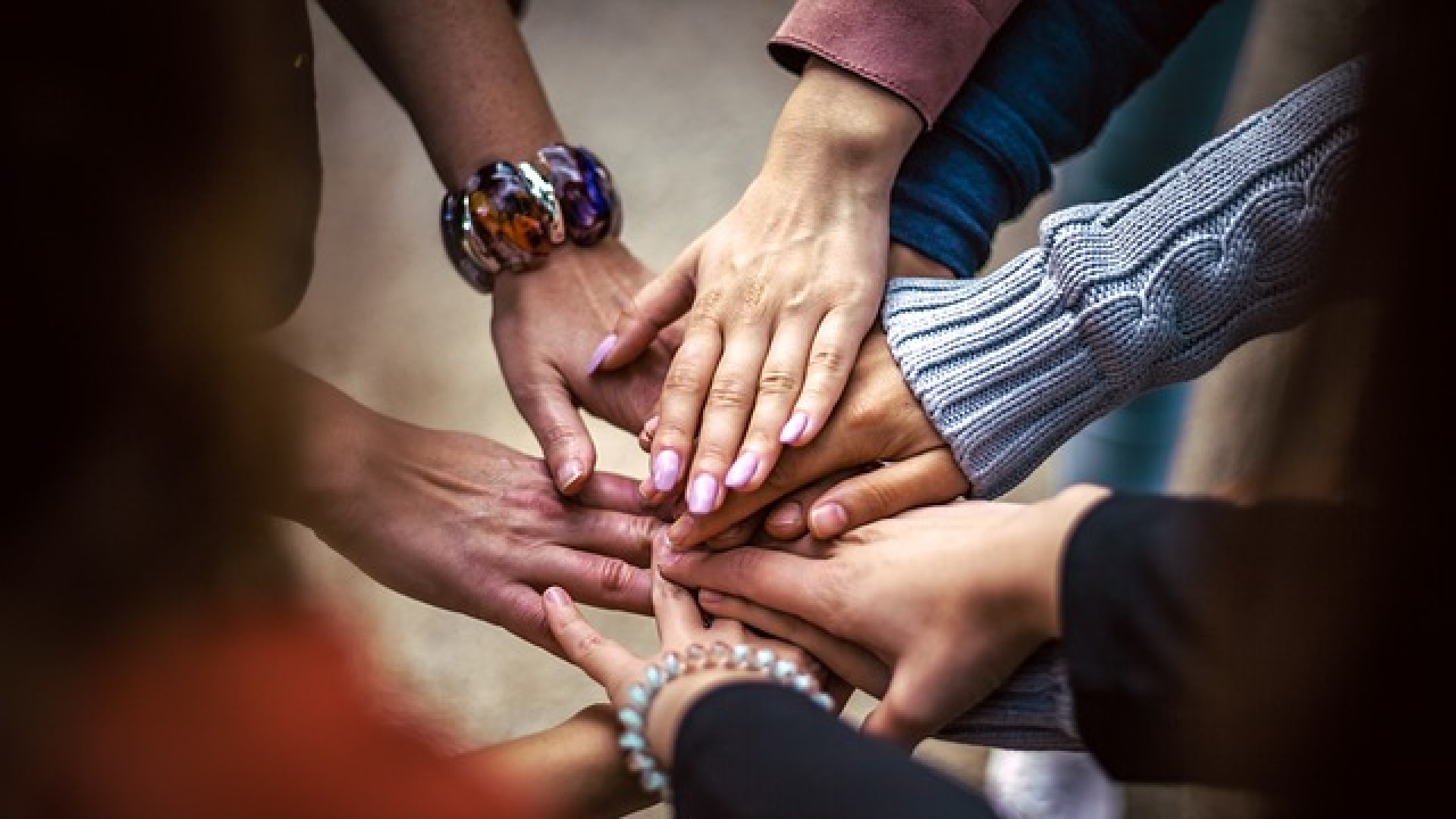 hands touching in a circle